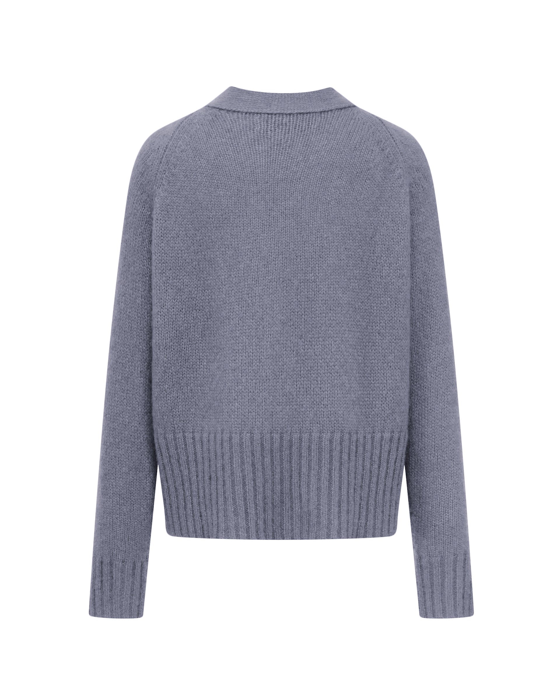 Damen Cardigan aus 75 % Kaschmir und 25 % Seide in Wheat – glatt gestrickter Cardigan in mittelschwerer Qualität mit oversized Form in breiter, kurzer Silhouette. Das Modell verfügt über Raglanärmel, lange, relaxte Ärmel sowie Knöpfe aus waschbarem Leder. Saum und Ärmelbündchen sind in Rippstruktur gearbeitet und verleihen dem Cardigan einen modernen, lässigen Look.