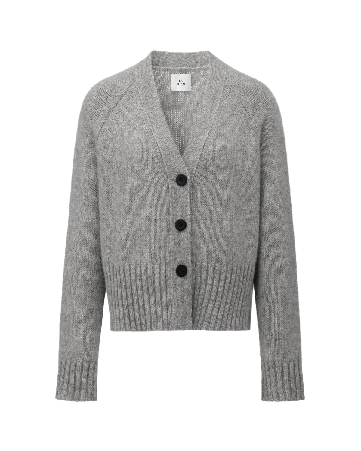 Damen Cardigan aus 75 % Kaschmir und 25 % Seide in Husky – glatt gestrickter Cardigan in mittelschwerer Qualität mit oversized Form in breiter, kurzer Silhouette. Das Modell verfügt über Raglanärmel, lange, relaxte Ärmel sowie Knöpfe aus waschbarem Leder. Saum und Ärmelbündchen sind in Rippstruktur gearbeitet und verleihen dem Cardigan einen modernen, lässigen Look.