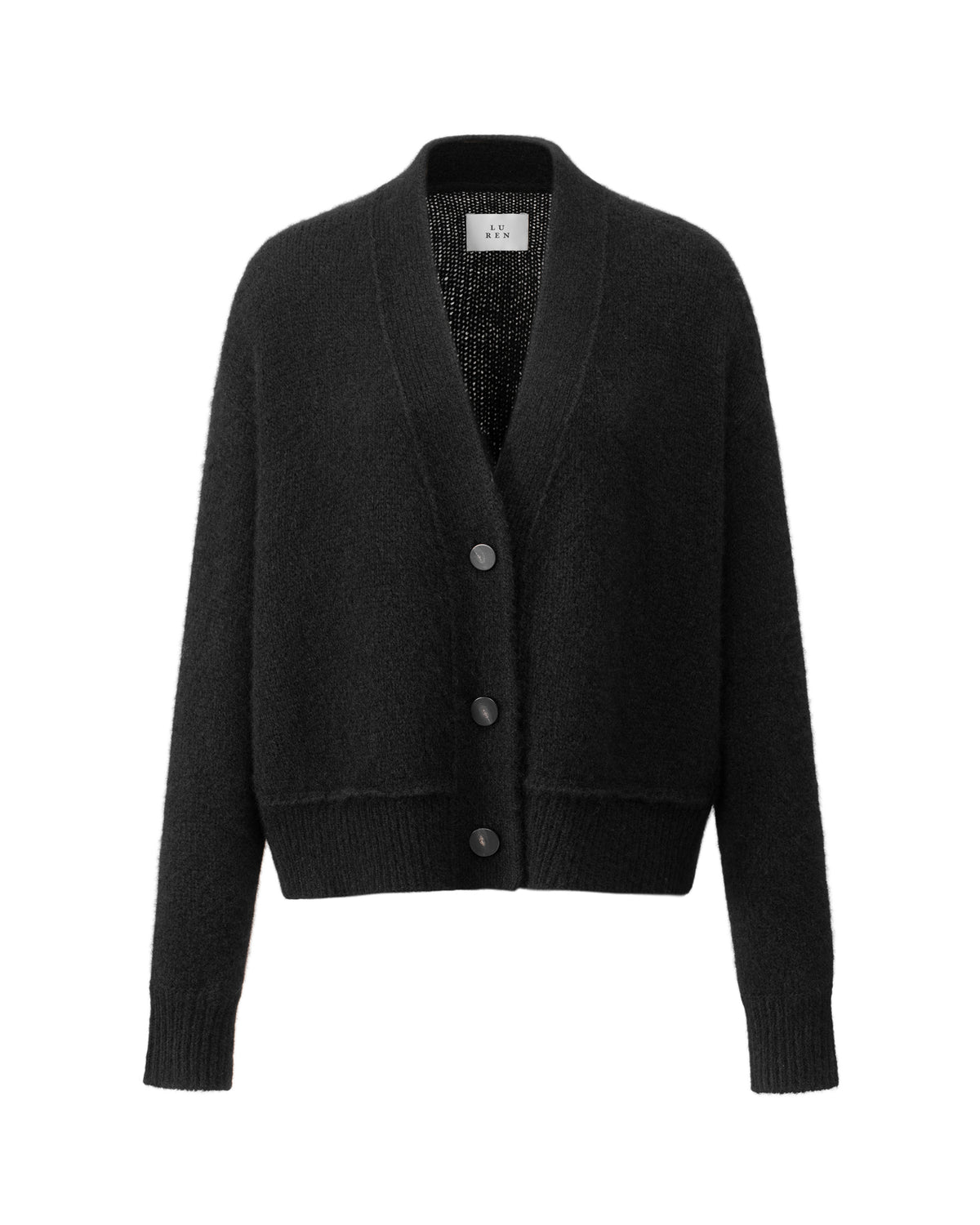 Damen Cardigan aus 75 % Kaschmir und 25 % Seide in Black – glatt gestrickter Cardigan in mittelschwerer Qualität mit kastiger Form in breiter, kurzer Silhouette. Das Modell verfügt über überschnittene Schultern, Hornknöpfe und lange, relaxte Ärmel. Saum und Ärmelbündchen sind in Rippstruktur gearbeitet und verleihen dem Cardigan einen modernen, lässigen Look.