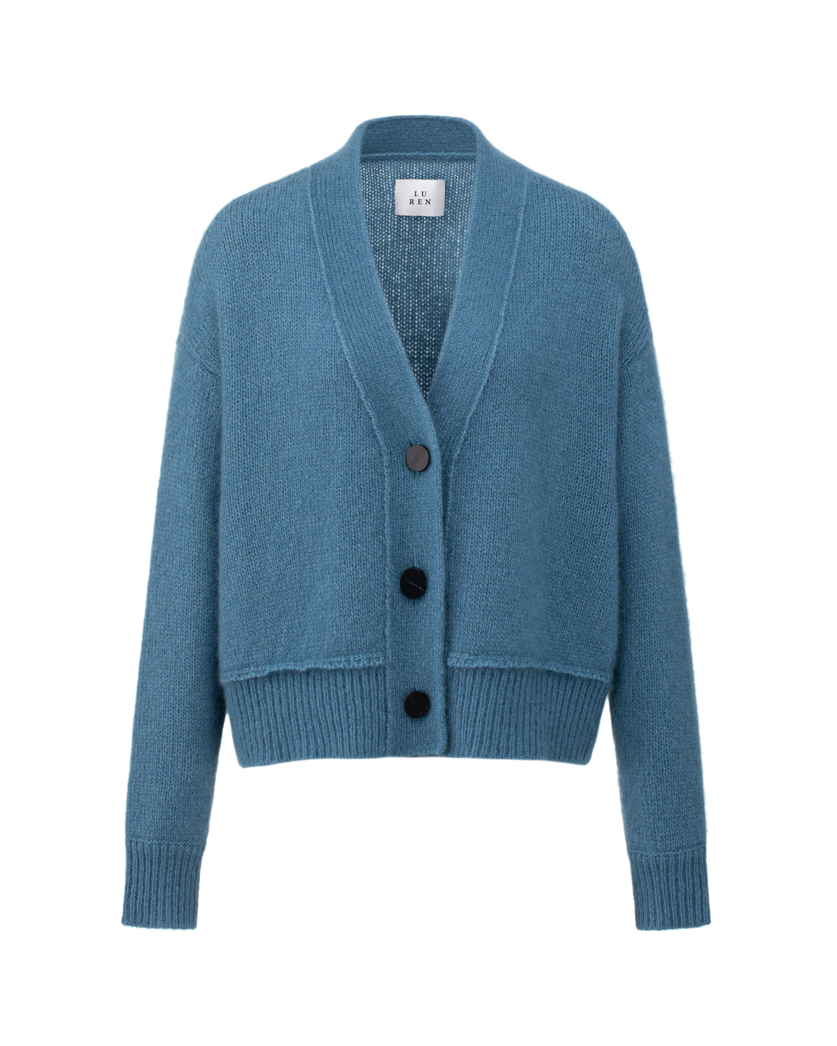 Damen Cardigan aus 75 % Kaschmir und 25 % Seide in Blue Fog – glatt gestrickter Cardigan in mittelschwerer Qualität mit kastiger Form in breiter, kurzer Silhouette. Das Modell verfügt über überschnittene Schultern, Hornknöpfe und lange, relaxte Ärmel. Saum und Ärmelbündchen sind in Rippstruktur gearbeitet und verleihen dem Cardigan einen modernen, lässigen Look.