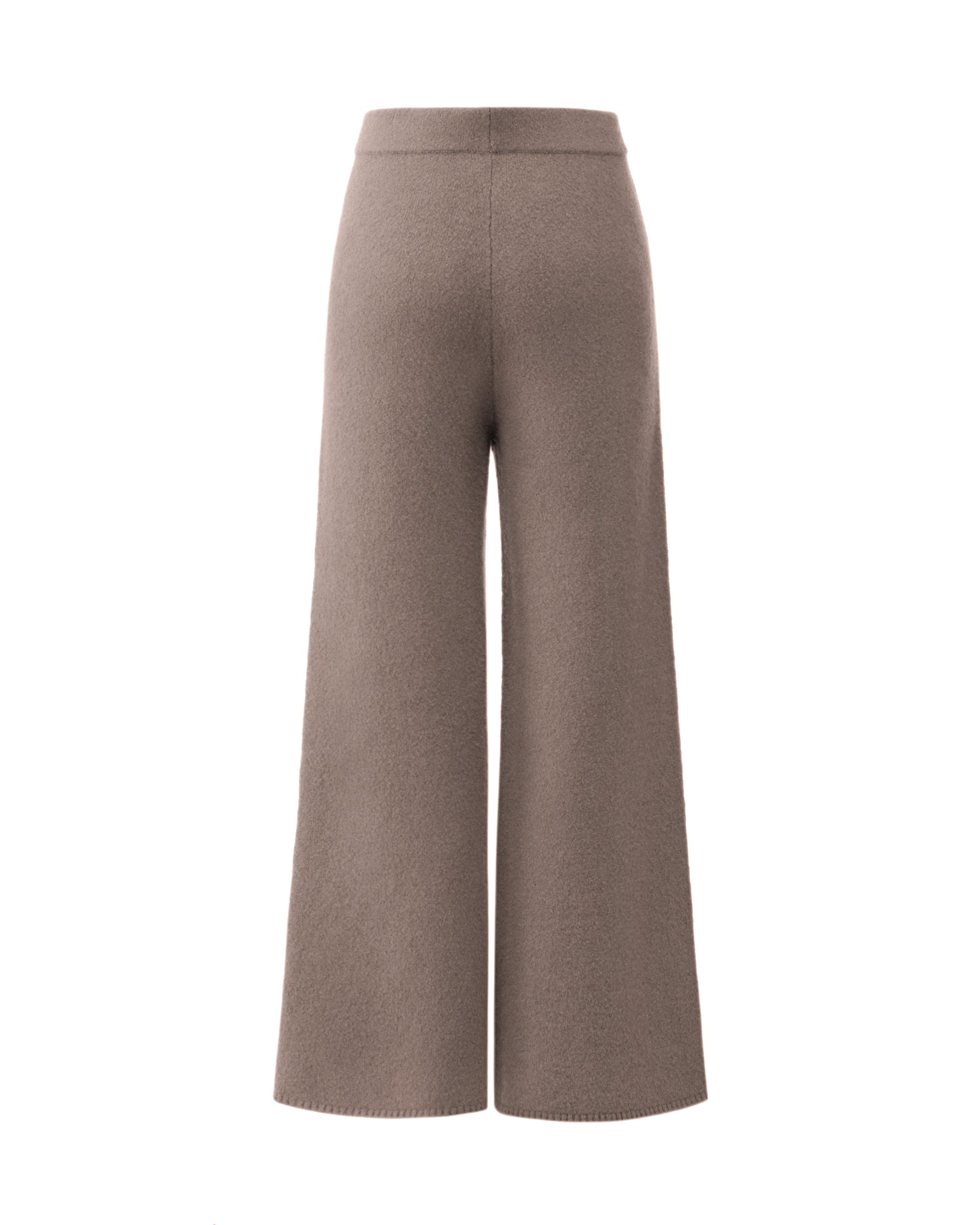 Damen Strickhose aus 80 % Kaschmir, 18 % Polyamid und 2 % Elastan in Natural Twine – glatt gestrickte Hose in mittelschwerer Qualität mit gefilzter, besonders elastischer Oberfläche. Das Modell verfügt über einen Bund mit Gummizug, aufgesetzte Taschen sowie ein zum Saum hin ausgestelltes Bein und vereint hohen Tragekomfort mit einer modernen Silhouette.