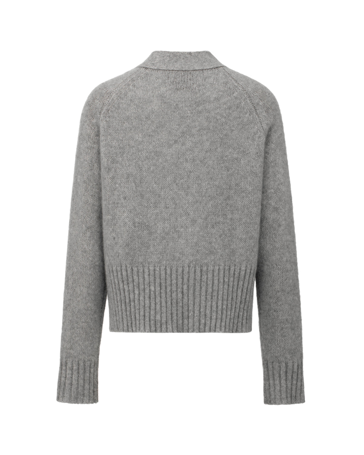 Damen Cardigan aus 75 % Kaschmir und 25 % Seide in Husky – glatt gestrickter Cardigan in mittelschwerer Qualität mit oversized Form in breiter, kurzer Silhouette. Das Modell verfügt über Raglanärmel, lange, relaxte Ärmel sowie Knöpfe aus waschbarem Leder. Saum und Ärmelbündchen sind in Rippstruktur gearbeitet und verleihen dem Cardigan einen modernen, lässigen Look.