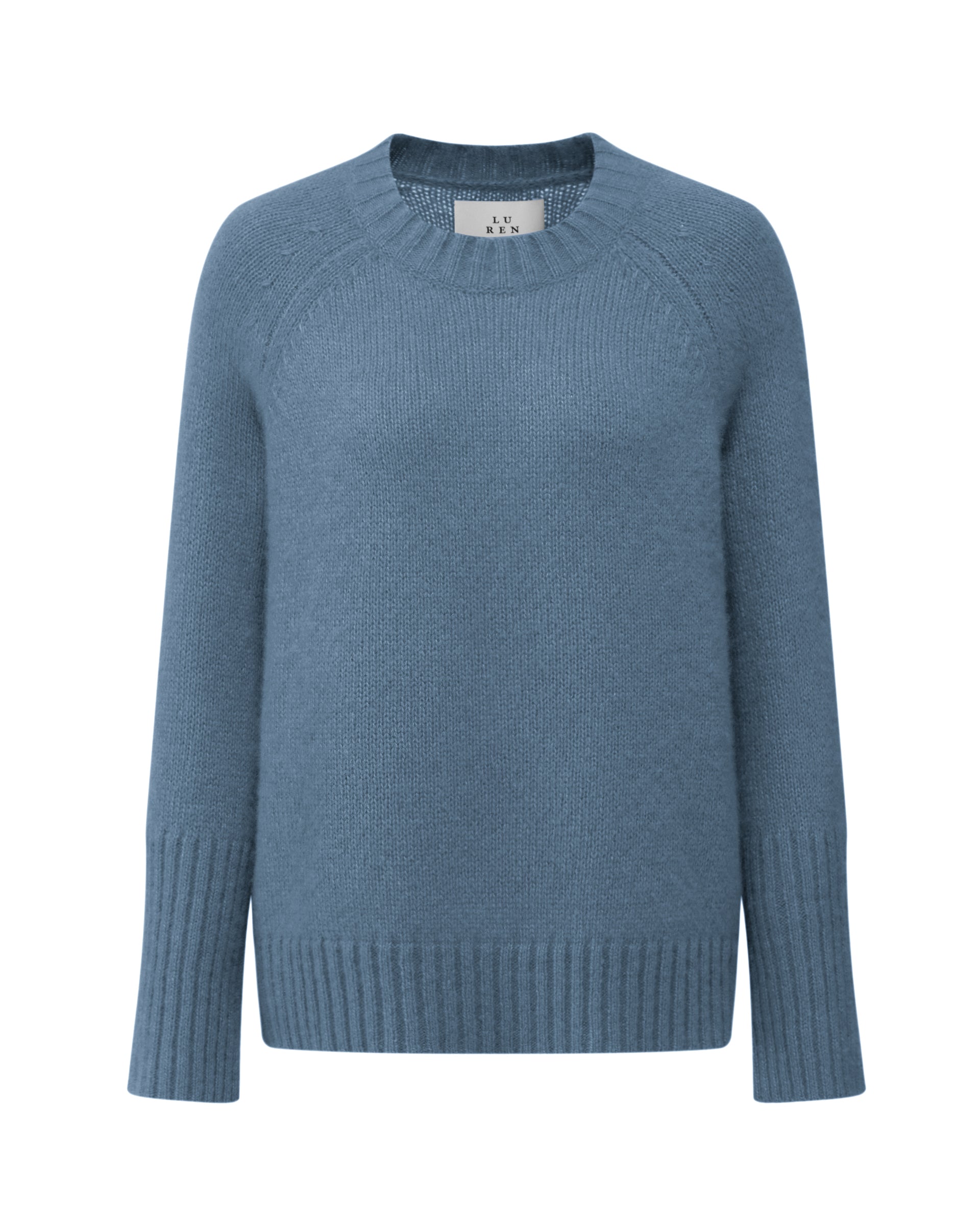 Damen Pullover aus 75 % Kaschmir und 25 % Seide in Blue Fog – glatt gestrickter Pullover in mittelschwerer Qualität mit kastiger, lockerer Passform, Rundhalsausschnitt mit Kragen in Rippstruktur, Raglanärmeln sowie langen, geraden Ärmeln mit Schlitz am Bündchen. Ärmelbündchen und Saum sind in Rippstruktur gearbeitet und verleihen dem Modell einen modernen, entspannten Look.
