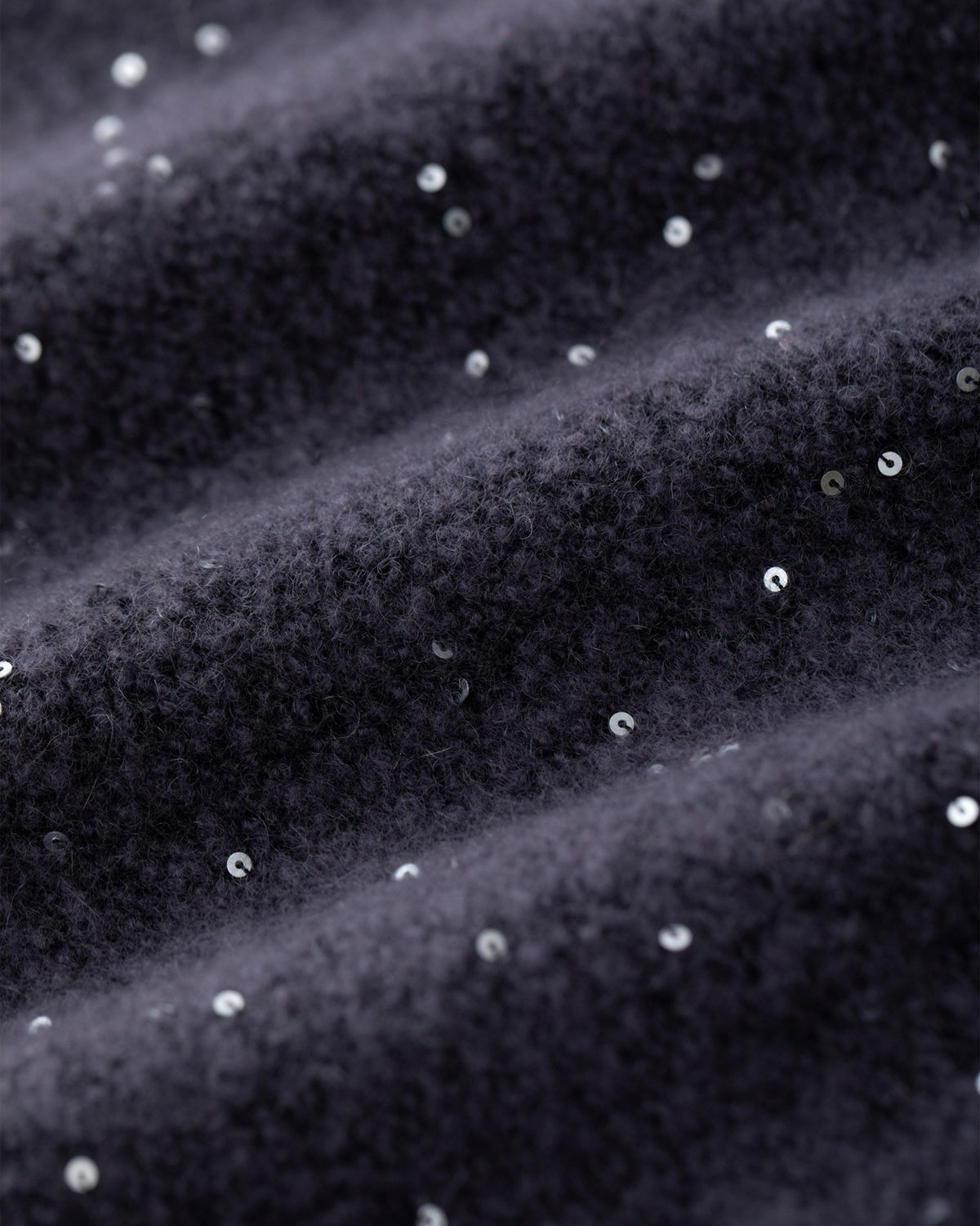 Damen Poncho aus 56% Kaschmir, 28% Baumwolle, 12% Polyamid, 2% Pailletten, 2% Elastan in Graphite Grey – Poncho mit Rundhalsausschnitt und eingearbeiteten Pailletten.